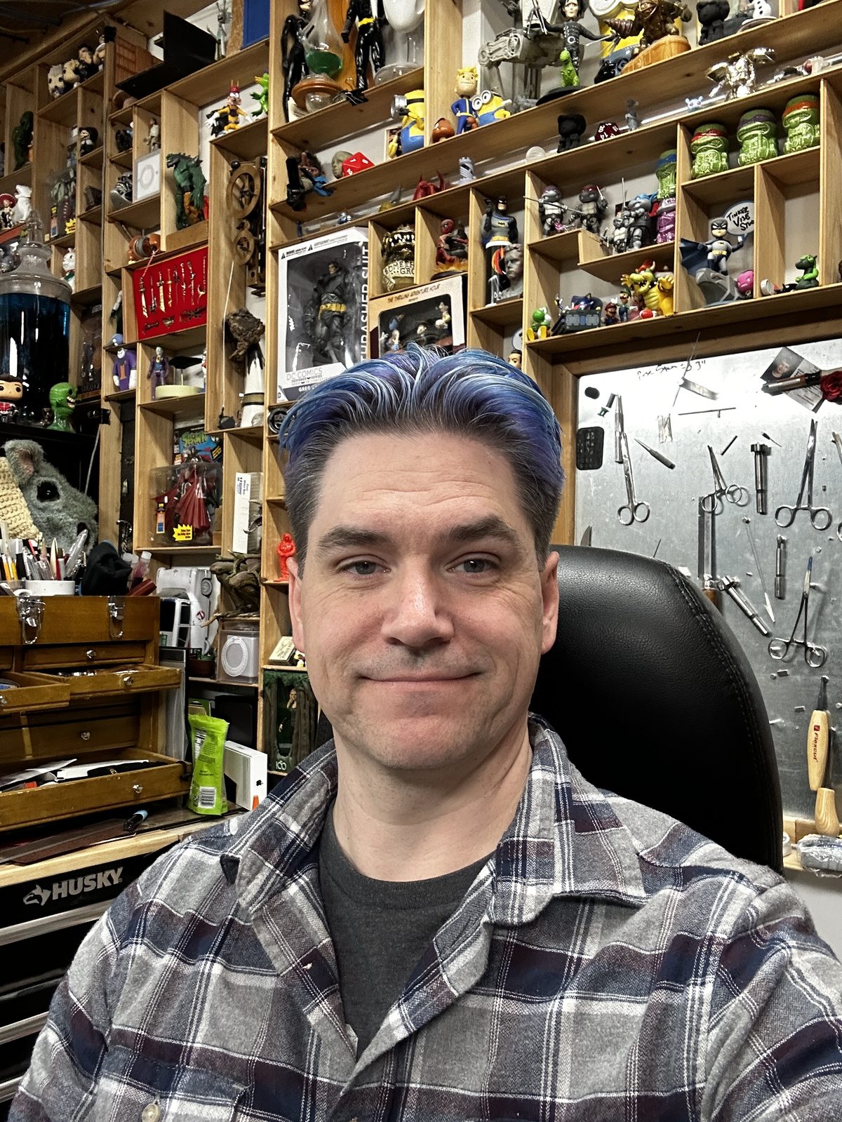 Paul in his workshop surrounded by tools